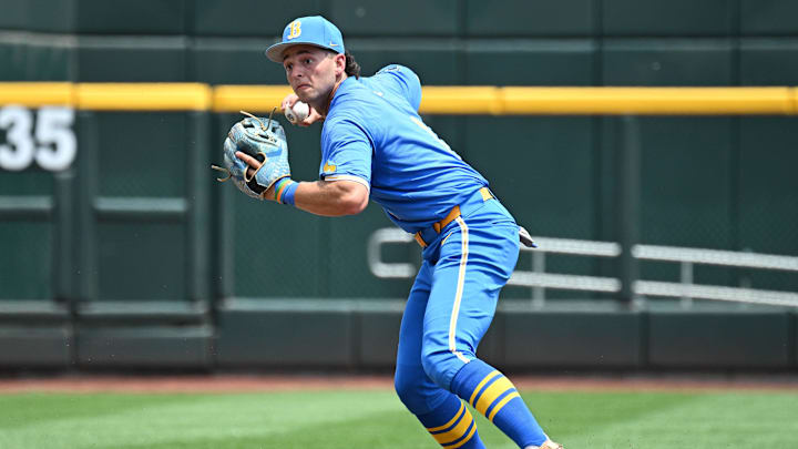 Jun 14, 2025; Omaha, Neb, USA; UCLA Bruins shortstop Roch Cholowsky (1) completes a double play against the Murray State Racers during the second inning at Charles Schwab Field. Mandatory Credit: Steven Branscombe-Imagn Images Jun 14, 2025; Omaha, Neb, USA; UCLA Bruins shortstop Roch Cholowsky (1) completes a double play against the Murray State Racers during the second inning at Charles Schwab Field. Mandatory Credit: Steven Branscombe-Imagn Images