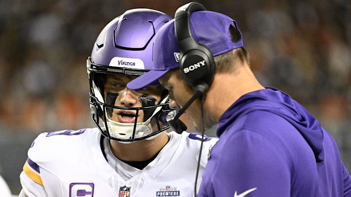 Sep 8, 2025; Chicago, Illinois, USA; Minnesota Vikings head coach Kevin O'Connell talks with quarterback J.J. McCarthy (9) during the first half at Soldier Field. Mandatory Credit: Matt Marton-Imagn Images