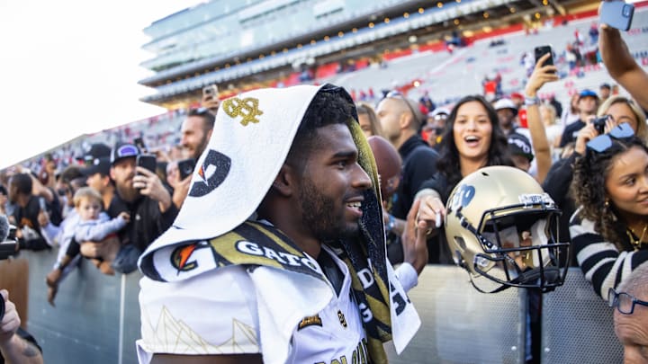 Oct 19, 2024; Tucson, Arizona, USA; Colorado Buffalos quarterback Shedeur Sanders (2) greets fans after defeating the Arizona Wildcats at Arizona Stadium. Mandatory Credit: Mark J. Rebilas-Imagn Images