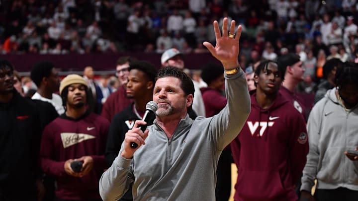 Jan 29, 2024; Blacksburg, Virginia, USA;  Virginia Tech Hokies football coach Brent Pry addresses the croud during the second half at Cassell Coliseum. Mandatory Credit: Brian Bishop-Imagn Images