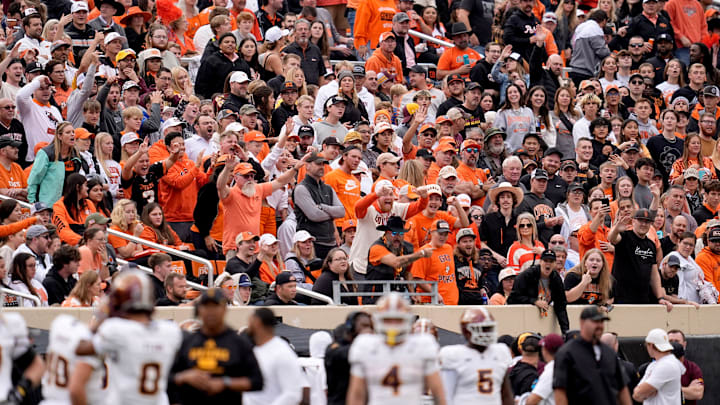The Oklahoma State fans react after an Arizona State player is ejected in the first half of the college football game between the Oklahoma State Cowboys and the Arizona State Sun Devils at Boone Pickens Stadium in Stillwater, OK. on Saturday, Nov. 2, 2024.