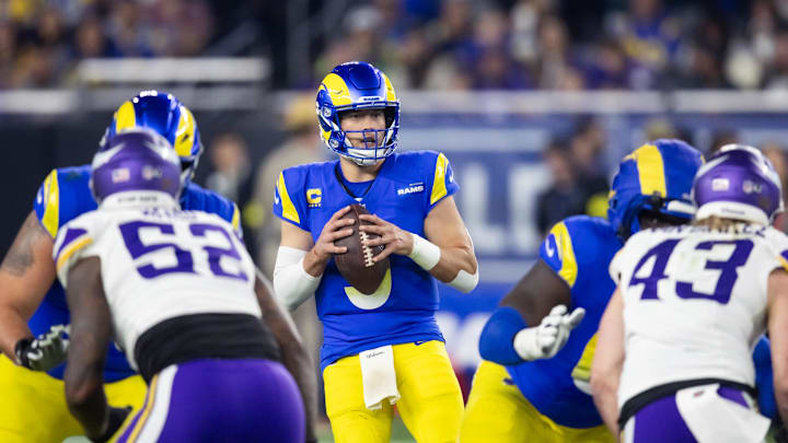 Jan 13, 2025; Glendale, AZ, USA; Los Angeles Rams quarterback Matthew Stafford (9) against the Minnesota Vikings during an NFC wild card game at State Farm Stadium. Mandatory Credit: Mark J. Rebilas-Imagn Images Jan 13, 2025; Glendale, AZ, USA; Los Angeles Rams quarterback Matthew Stafford (9) against the Minnesota Vikings during an NFC wild card game at State Farm Stadium. Mandatory Credit: Mark J. Rebilas-Imagn Images