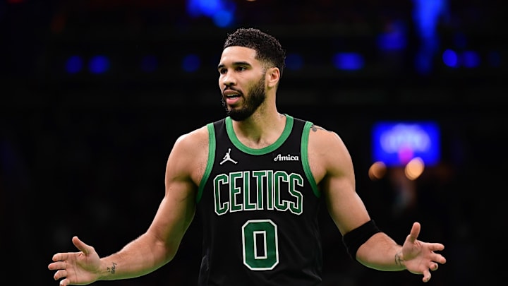 Nov 19, 2024; Boston, Massachusetts, USA;  Boston Celtics forward Jayson Tatum (0) questions a non call to the official during the second half against the Cleveland Cavaliers at TD Garden. Mandatory Credit: Bob DeChiara-Imagn Images