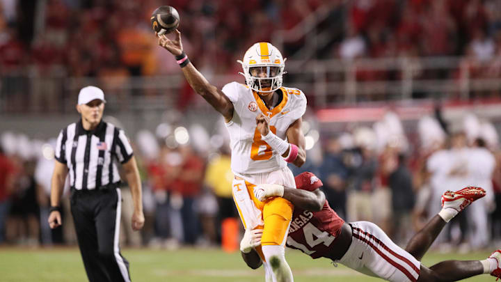 Oct 5, 2024; Fayetteville, Arkansas, USA; Tennessee Volunteers quarterback Nico Iamaleava (8) passes in the second quarter against the Arkansas Razorbacks at Donald W. Reynolds Razorback Stadium. Mandatory Credit: Nelson Chenault-Imagn Images