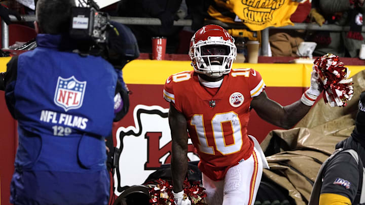Jan 16, 2022; Kansas City, Missouri, USA; Kansas City Chiefs wide receiver Tyreek Hill (10) celebrates after a touchdown catch during the second half against the Pittsburgh Steelers in an AFC Wild Card playoff football game at GEHA Field at Arrowhead Stadium. Mandatory Credit: Denny Medley-Imagn Images