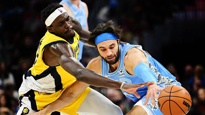 Jan 12, 2025; Cleveland, Ohio, USA; Indiana Pacers forward Pascal Siakam (43) knocks the ball away from Cleveland Cavaliers guard Max Strus (1) during the second half at Rocket Mortgage FieldHouse. Mandatory Credit: Ken Blaze-Imagn Images Jan 12, 2025; Cleveland, Ohio, USA; Indiana Pacers forward Pascal Siakam (43) knocks the ball away from Cleveland Cavaliers guard Max Strus (1) during the second half at Rocket Mortgage FieldHouse. Mandatory Credit: Ken Blaze-Imagn Images