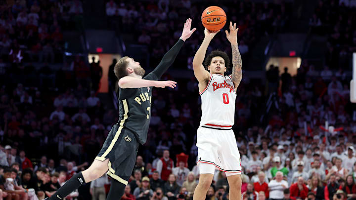 Mar 1, 2026; Columbus, Ohio, USA; Ohio State Buckeyes guard John Mobley Jr. (0) shoots the ball as Purdue Boilermakers guard Braden Smith (3) defends during the second half at Value City Arena. Mandatory Credit: Joseph Maiorana-Imagn Images Mar 1, 2026; Columbus, Ohio, USA; Ohio State Buckeyes guard John Mobley Jr. (0) shoots the ball as Purdue Boilermakers guard Braden Smith (3) defends during the second half at Value City Arena. Mandatory Credit: Joseph Maiorana-Imagn Images