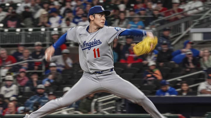 May 3, 2025; Cumberland, Georgia, USA; Los Angeles Dodgers starting pitcher Roki Sasaki (11) pitches against the Atlanta Braves during the third inning at Truist Park. Mandatory Credit: Dale Zanine-Imagn Images May 3, 2025; Cumberland, Georgia, USA; Los Angeles Dodgers starting pitcher Roki Sasaki (11) pitches against the Atlanta Braves during the third inning at Truist Park. Mandatory Credit: Dale Zanine-Imagn Images