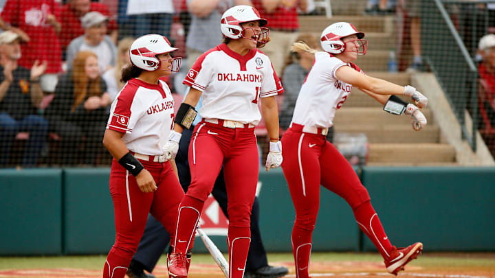 Oklahoma's Nicole Mendes celebrates after scoring a run in the second inning Sunday in a 24-7 win against Wichita State at Marita Hynes Field in Norman.