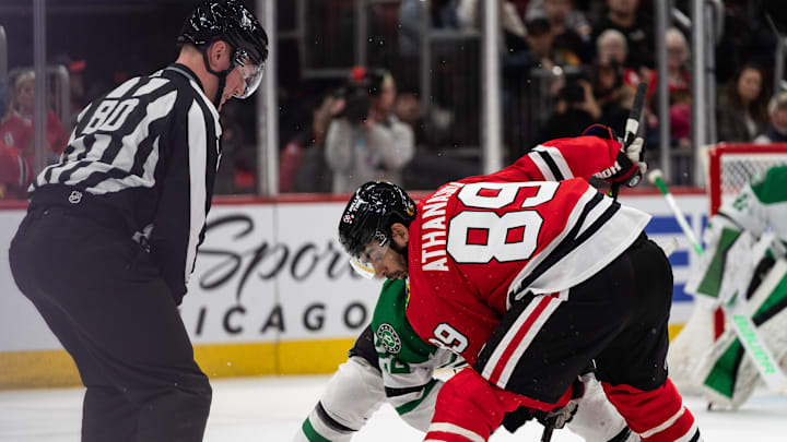 Apr 6, 2024; Chicago, Illinois, USA; Chicago Blackhawks center Andreas Athanasiou (89) attempts to
