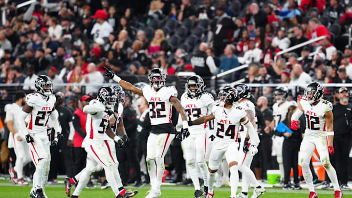Dec 16, 2024; Paradise, Nevada, USA; Atlanta Falcons cornerback Kevin King (32) celebrates with teammates after making a play against the Las Vegas Raiders during the fourth quarter at Allegiant Stadium. Mandatory Credit: Stephen R. Sylvanie-Imagn Images