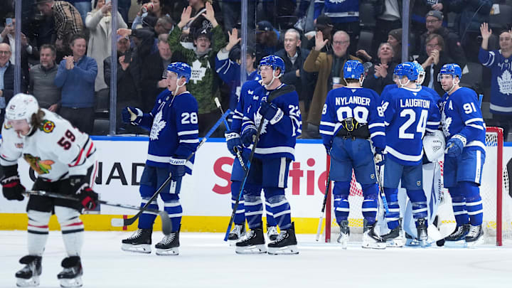 Dec 16, 2025; Toronto, Ontario, CAN; The Toronto Maple Leafs celebrate the win against the Chicago Blackhawks at the end of the third period at Scotiabank Arena. Mandatory Credit: Nick Turchiaro-Imagn Images