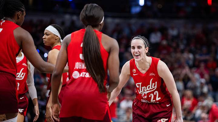 May 22, 2026; Indianapolis, Indiana, USA;  Indiana Fever guard Caitlin Clark (22) celebrates a made shot with  guard Raven Johnson (3) in the second half against the Golden State Valkyries at Gainbridge Fieldhouse. Mandatory Credit: Trevor Ruszkowski-Imagn Images