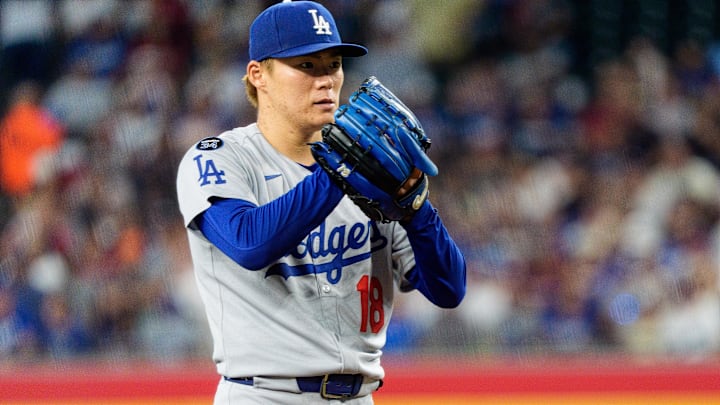 Los Angeles Dodgers pitcher Yoshinobu Yamamoto (18) on the mound in the seventh inning against the Arizona Diamondbacks at Chase Field. 