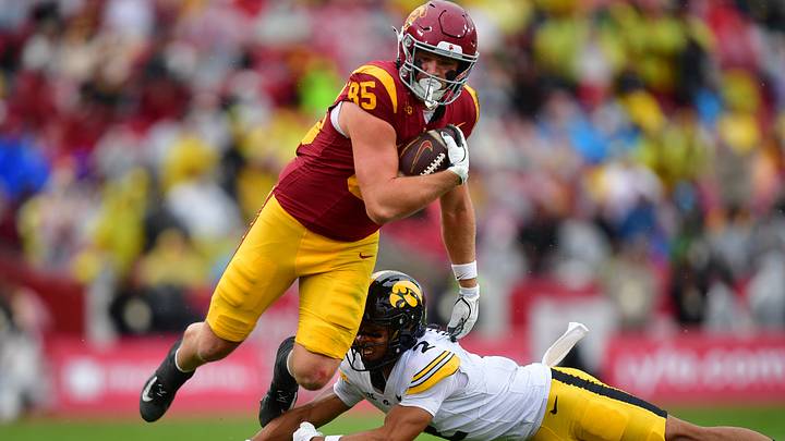 Nov 15, 2025; Los Angeles, California, USA; Southern California Trojans tight end Walker Lyons (85) runs the ball against Iowa Hawkeyes defensive back TJ Hall (2) during the first half at the Los Angeles Memorial Coliseum. Mandatory Credit: Gary A. Vasquez-Imagn Images Nov 15, 2025; Los Angeles, California, USA; Southern California Trojans tight end Walker Lyons (85) runs the ball against Iowa Hawkeyes defensive back TJ Hall (2) during the first half at the Los Angeles Memorial Coliseum. Mandatory Credit: Gary A. Vasquez-Imagn Images