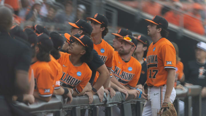 Jun 3, 2024; Stillwater, OK, USA; Oklahoma State infielder Tyler Wulfert (17) watches a foul ball with the dugout during a NCAA regional baseball game against Florida at O'Brate Stadium. Mandatory Credit: Mitch Alcala-The Oklahoman Jun 3, 2024; Stillwater, OK, USA; Oklahoma State infielder Tyler Wulfert (17) watches a foul ball with the dugout during a NCAA regional baseball game against Florida at O'Brate Stadium. Mandatory Credit: Mitch Alcala-The Oklahoman