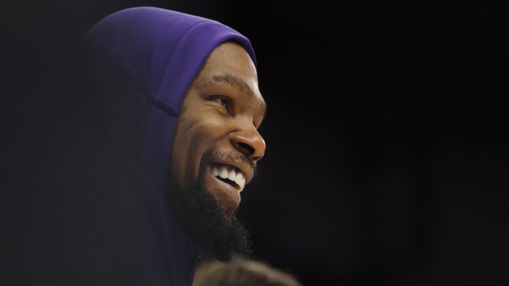 Apr 14, 2024; Minneapolis, Minnesota, USA; Phoenix Suns forward Kevin Durant (35) smiles from the