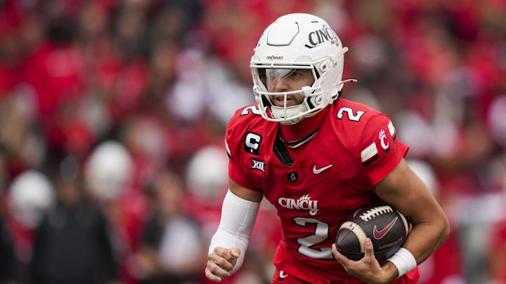 Cincinnati, Ohio, USA;  Cincinnati Bearcats quarterback Brendan Sorsby (2) runs with the ball against the Baylor Bears in the first half at Nippert Stadium.