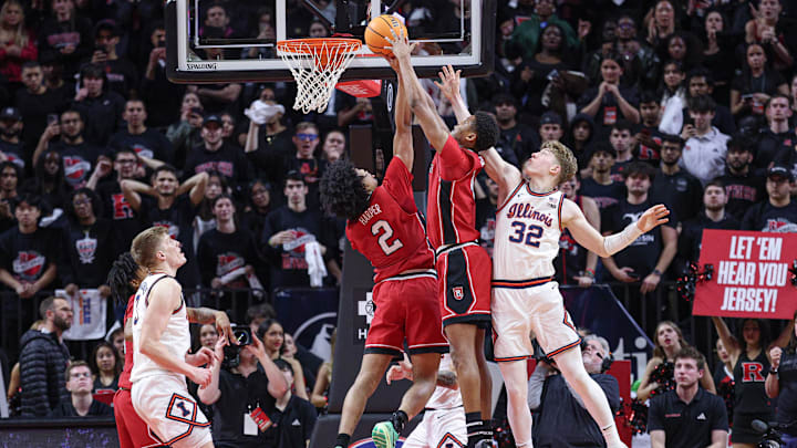 Feb 5, 2025; Piscataway, New Jersey, USA; Rutgers Scarlet Knights guard Ace Bailey (4) and guard Dylan Harper (2) rebound against Illinois Fighting Illini guard Kasparas Jakucionis (32) during the second half at Jersey Mike's Arena. Mandatory Credit: Vincent Carchietta-Imagn Images