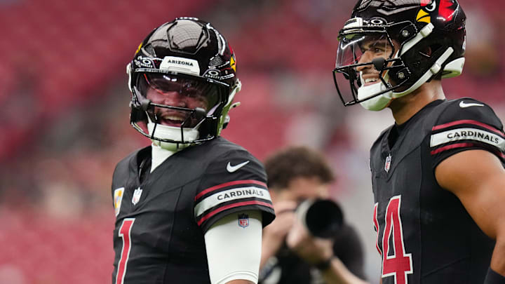 Arizona Cardinals quarterback Kyler Murray (1) chats with teammate Michael Wilson (14) before their game against the Tennessee Titans at State Farm Stadium in Glendale on Oct. 5, 2025.