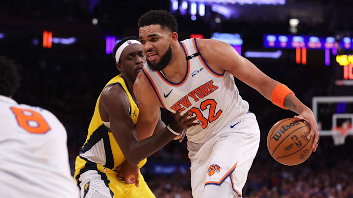 May 21, 2025; New York, New York, USA; New York Knicks center Karl-Anthony Towns (32) controls the ball against Indiana Pacers forward Pascal Siakam (43) in the third quarter during game one of the eastern conference finals for the 2025 NBA Playoffs at Madison Square Garden. Mandatory Credit: Brad Penner-Imagn Images