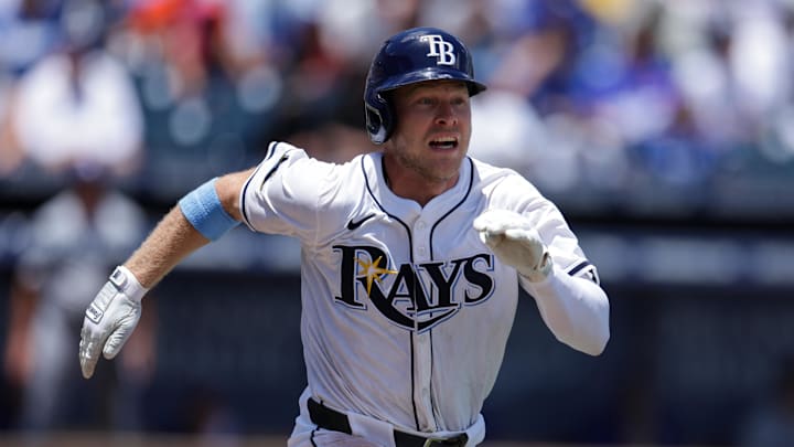 Aug 3, 2025; Tampa, Florida, USA; Tampa Bay Rays shortstop Taylor Walls (6) singles against the Los Angeles Dodgers in the fifth inning at George M. Steinbrenner Field. Mandatory Credit: Nathan Ray Seebeck-Imagn Images