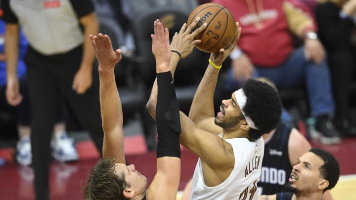 Feb 22, 2024; Cleveland, Ohio, USA; Cleveland Cavaliers center Jarrett Allen (31) shoots beside