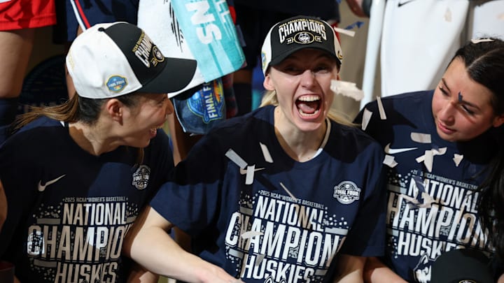 Connecticut Huskies guard Kaitlyn Chen (20) and guard Paige Bueckers (5) celebrates after winning the national championship of the women's 2025 NCAA tournament against the South Carolina Gamecocks.