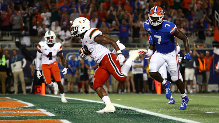 Aug 24, 2019; Orlando, FL, USA; Miami Hurricanes tight end Brevin Jordan (9) runs past Florida
