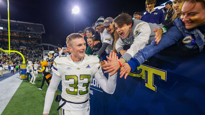 Nov 21, 2024; Atlanta, Georgia, USA; Georgia Tech Yellow Jackets place kicker Aidan Birr (33) celebrates with fans after a victory over North Carolina State Wolfpack at Bobby Dodd Stadium at Hyundai Field. Mandatory Credit: Brett Davis-Imagn Images
