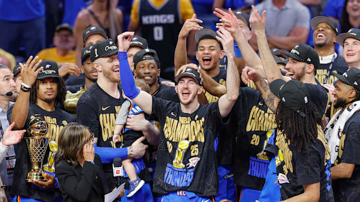 Jun 22, 2025; Oklahoma City, Oklahoma, USA; Oklahoma City Thunder guard Alex Caruso (9) during the NBA Championship trophy presentation after game seven of the 2025 NBA Finals against the Indiana Pacers at Paycom Center. Mandatory Credit: Alonzo Adams-Imagn Images