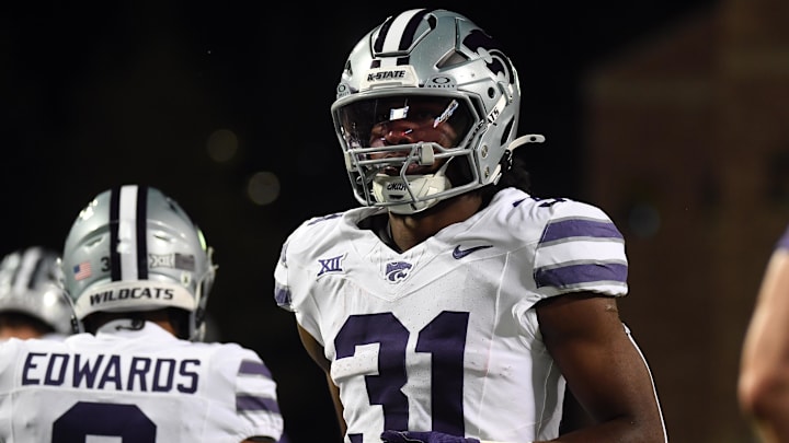 Oct 12, 2024; Boulder, Colorado, USA; Kansas State Wildcats running back DJ Giddens (31) warms up before the game against the Colorado Buffaloes at Folsom Field. 