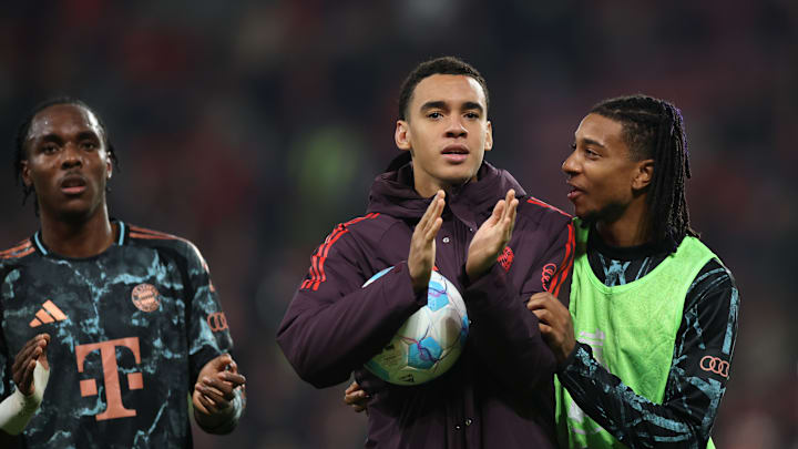 Jamal Musiala with the match ball after his hat-trick against Mainz 05