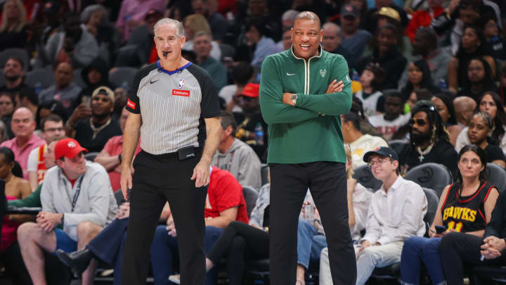 Mar 30, 2024; Atlanta, Georgia, USA; Milwaukee Bucks head coach Doc Rivers talks to referee Scott Wall (31) against the Atlanta Hawks in the second quarter at State Farm Arena. Mandatory Credit: Brett Davis-USA TODAY Sports