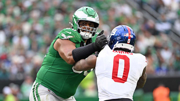 Oct 26, 2025; Philadelphia, Pennsylvania, USA; Philadelphia Eagles offensive tackle Jordan Mailata (68) blocks New York Giants linebacker Brian Burns (0) during the third quarter at Lincoln Financial Field. Mandatory Credit: Eric Hartline-Imagn Images