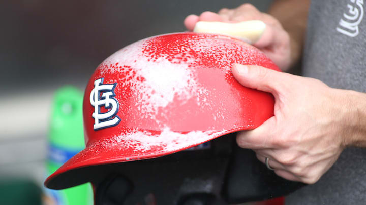 Aug 3, 2018; Pittsburgh, PA, USA; A St. Louis Cardinals equipment manager polishes batting helmets before the Pittsburgh Pirates host the Cardinals at PNC Park. Mandatory Credit: Charles LeClaire-Imagn Images Aug 3, 2018; Pittsburgh, PA, USA; A St. Louis Cardinals equipment manager polishes batting helmets before the Pittsburgh Pirates host the Cardinals at PNC Park. Mandatory Credit: Charles LeClaire-Imagn Images