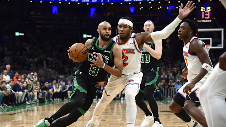 May 14, 2025; Boston, Massachusetts, USA; Boston Celtics guard Derrick White (9) controls the ball while New York Knicks guard Miles McBride (2) defends in the second half during game five of the second round for the 2025 NBA Playoffs at TD Garden. Mandatory Credit: Bob DeChiara-Imagn Images May 14, 2025; Boston, Massachusetts, USA; Boston Celtics guard Derrick White (9) controls the ball while New York Knicks guard Miles McBride (2) defends in the second half during game five of the second round for the 2025 NBA Playoffs at TD Garden. Mandatory Credit: Bob DeChiara-Imagn Images