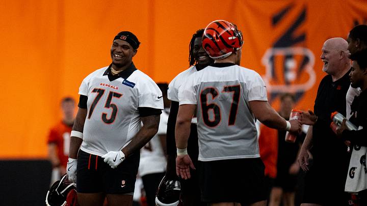 Cincinnati Bengals offensive tackle Orlando Brown Jr. (75) laughs at Bengals spring practice at the IEL Indoor Facility in Cincinnati on Thursday, June 13, 2024. Cincinnati Bengals offensive tackle Orlando Brown Jr. (75) laughs at Bengals spring practice at the IEL Indoor Facility in Cincinnati on Thursday, June 13, 2024.
