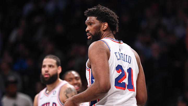 Jan 4, 2025; Brooklyn, New York, USA; Philadelphia 76ers center Joel Embiid (21) looks back during the first half against the Brooklyn Nets at Barclays Center. Mandatory Credit: Vincent Carchietta-Imagn Images Jan 4, 2025; Brooklyn, New York, USA; Philadelphia 76ers center Joel Embiid (21) looks back during the first half against the Brooklyn Nets at Barclays Center. Mandatory Credit: Vincent Carchietta-Imagn Images