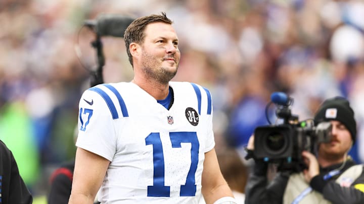 Dec 14, 2025; Seattle, Washington, USA; Indianapolis Colts quarterback Philip Rivers (17) walks to the locker room following the second quarter against the Seattle Seahawks at Lumen Field. Mandatory Credit: Kevin Ng-Imagn Images