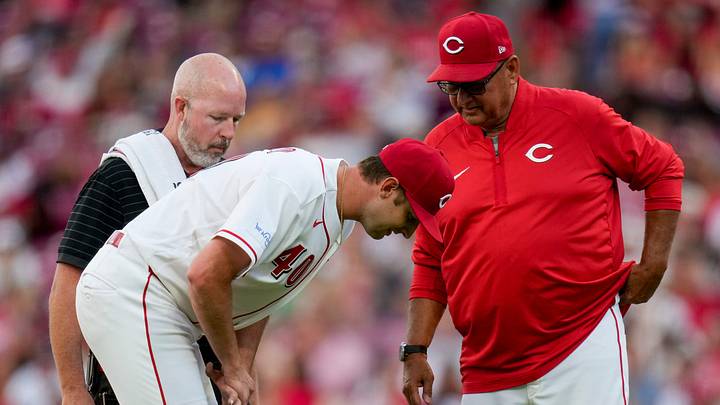 Cincinnati Reds pitcher Nick Lodolo (40) clutches his wrist after being hit by a line drive in the fourth inning of the MLB National League Central game between the Cincinnati Reds and the Milwaukee Brewers at Great American Ball Park in downtown Cincinnati on Tuesday, June 23, 2026.