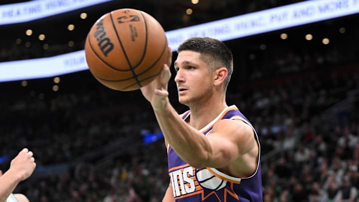 Mar 16, 2026; Boston, Massachusetts, USA; Phoenix Suns guard Grayson Allen (8) passes the ball against the Boston Celtics during the first half at the TD Garden. Mandatory Credit: Brian Fluharty-Imagn Images