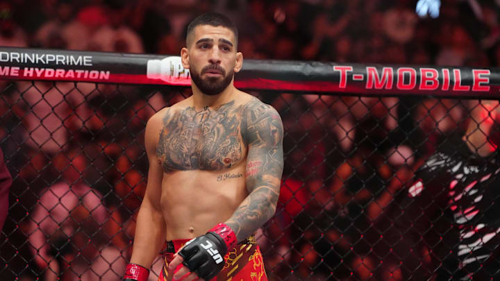 Jun 28, 2025; Las Vegas, Nevada, USA; Ilia Topuria (red gloves) prior to the fight against Charles Oliveira (blue gloves) during UFC 317 at T-Mobile Arena. Mandatory Credit: Stephen R. Sylvanie-Imagn Images