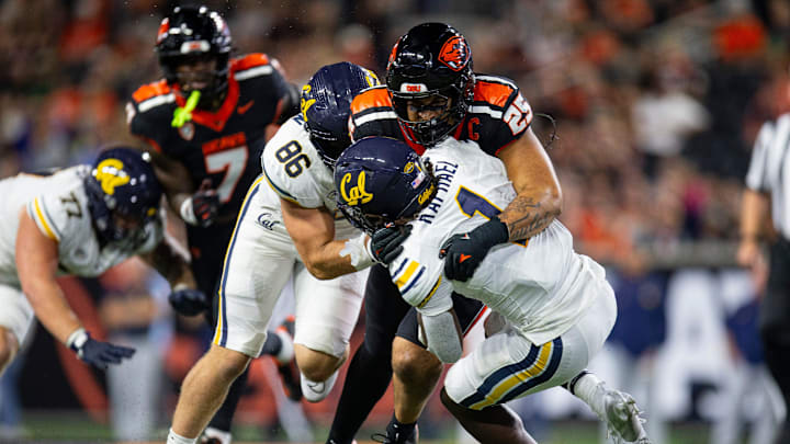 Oregon State's Nikko Taylor tackles California's Kendrick Raphael during an NCAA football game against California at Reser Stadium on Saturday, Aug. 30, 2025, in Corvallis, Ore.
