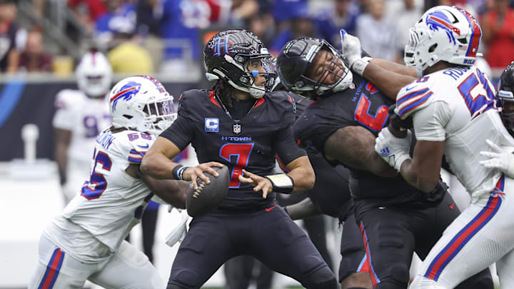 Oct 6, 2024; Houston, Texas, USA; Houston Texans quarterback C.J. Stroud (7) looks for an open receiver during the fourth quarter against the Buffalo Bills at NRG Stadium. Mandatory Credit: Troy Taormina-Imagn Images
