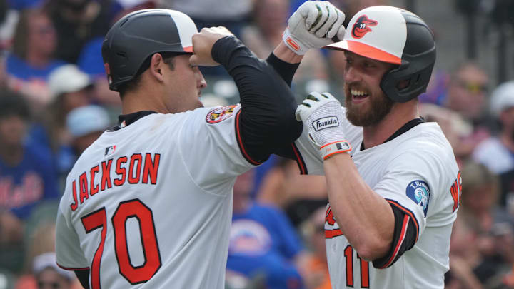 Baltimore Orioles second baseman Jordan Westburg (11) greeted by catcher Alex Jackson (70) following his two run home run during the second inning against the New York Mets at Oriole Park at Camden Yards.