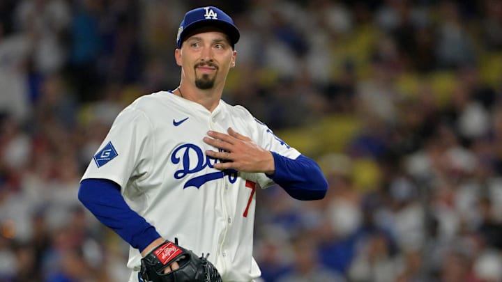 Sep 30, 2025; Los Angeles, California, USA; Los Angeles Dodgers starting pitcher Blake Snell (7) takes a deep breath as he heads to the dugout following the fourth inning of game one of the Wildcard round for the 2025 MLB playoffs against the Cincinnati Reds at Dodger Stadium. Mandatory Credit: Jayne Kamin-Oncea-Imagn Images