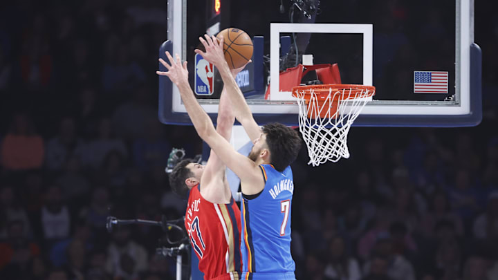 Feb 10, 2025; Oklahoma City, Oklahoma, USA; Oklahoma City Thunder forward Chet Holmgren (7) blocks a shot by New Orleans Pelicans center Karlo Matkovic (17) during the first quarter at Paycom Center. Feb 10, 2025; Oklahoma City, Oklahoma, USA; Oklahoma City Thunder forward Chet Holmgren (7) blocks a shot by New Orleans Pelicans center Karlo Matkovic (17) during the first quarter at Paycom Center.
