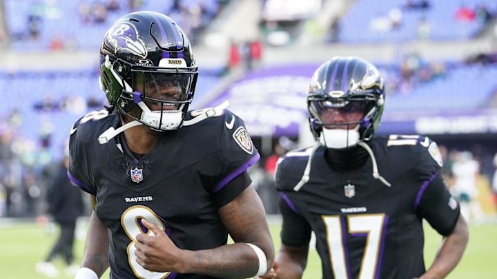 Dec 1, 2024; Baltimore, Maryland, USA; Baltimore Ravens quarterbacks Lamar Jackson (8) and Josh Johnson (17) enter the field prior the game  against the Philadelphia Eagles at M&T Bank Stadium. Mandatory Credit: Mitch Stringer-Imagn Images
