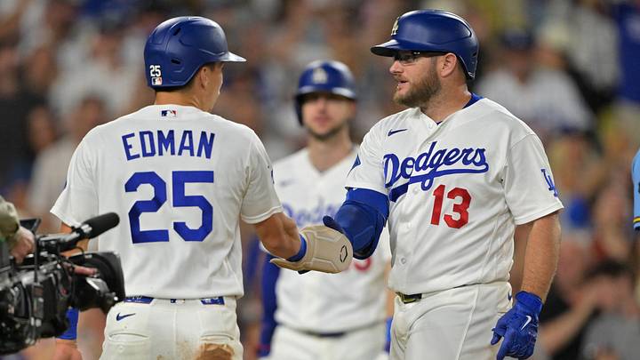 Aug 13, 2026; Los Angeles, California, USA; Los Angeles Dodgers third baseman Max Muncy (13) is greeted by second baseman Tommy Edman (25) after hitting a three-run home run in the sixth inning against the Milwaukee Brewers at Dodger Stadium. Mandatory Credit: Jayne Kamin-Oncea-Imagn Images Aug 13, 2026; Los Angeles, California, USA; Los Angeles Dodgers third baseman Max Muncy (13) is greeted by second baseman Tommy Edman (25) after hitting a three-run home run in the sixth inning against the Milwaukee Brewers at Dodger Stadium. Mandatory Credit: Jayne Kamin-Oncea-Imagn Images